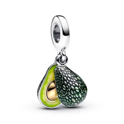 A silver charm shaped like an avocado, split in half, with one half showing the pit and flesh, and the other half showing the textured skin.