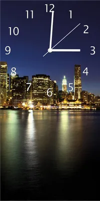 Produktbild von Wallario Design Wanduhr bedruckt, Größe 30 x 60 cm, Motiv: New York Skyline - Brooklyn Bridge und Manhattan am Abend