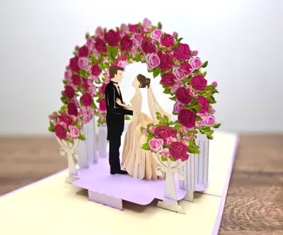 Produktbild von 3D Pop-up-Hochzeitskarte mit Rosenblumenbogen und Hochzeitspaar-Figuren