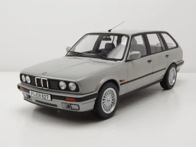 Produktbild von BMW 325i E30 Touring Kombi 1991 silber Modellauto 1:18 Norev