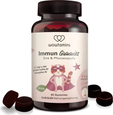 A bottle of WOWTAMINS Immun Gummies for kids, with some gummies scattered around the base.