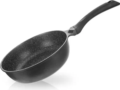 A black frying pan with a speckled interior and a black handle, shown from a side angle against a white background.
