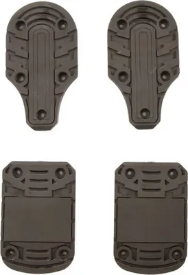 Four black ski boot parts are arranged in a two-by-two grid against a white background.