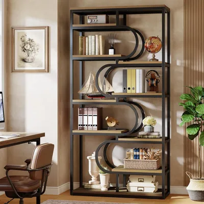 A bookshelf filled with decorative items and books in a home office setting.