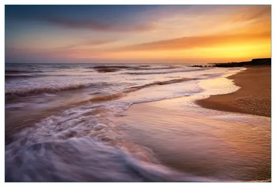 Produktbild von Wallario Küchenrückwand aus Glas, Größe: 90 x 60 cm, Motiv: Sonnenuntergang am Strand - Abendspaziergang | Spritzschutz | abwischbar | pflegeleicht | in