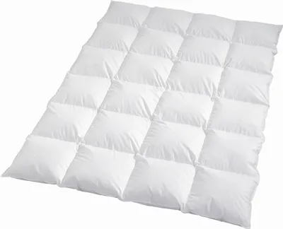 A white down comforter is shown laid out on a white background.