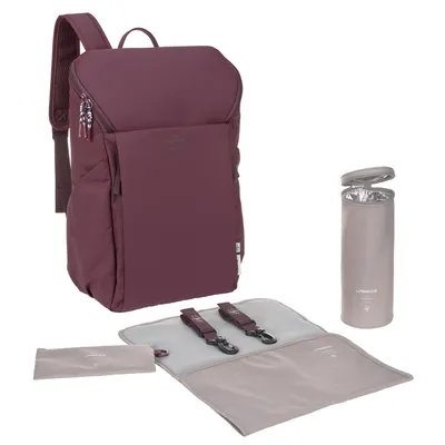 A deep red backpack with accessories laid out.