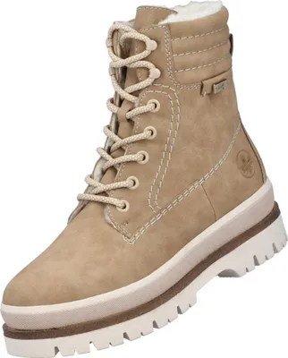 Auf dem Bild ist ein beiger Stiefel abgebildet der von der Seite betrachtet wird. Der Stiefel zeigt eine hohe Form mit einer strukturierten Oberfläche und ist eindeutig für kalte Tage geeignet.