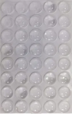 A grid of transparent silicone pads.
