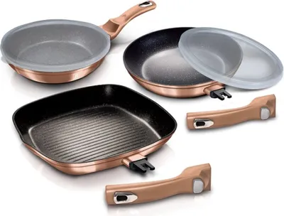 A set of three rose gold cookware items with detachable handles and lids, arranged on a white background.