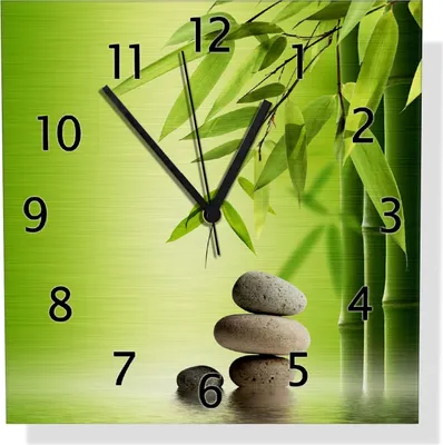 Produktbild von Wallario Design Wanduhr Steinstapel im Grünen aus Aluverbund, Größe 30 x 30 cm