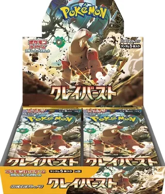A display box of Pokemon trading cards, specifically the Clay Burst set, with booster packs visible.