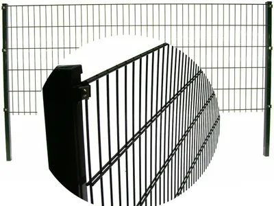 A close-up view of a black metal fence panel and its post attachment, with a wider view of the fence in the background.