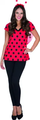 A woman is posing in a ladybug costume against a white background.