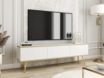 A modern living room scene featuring a white TV stand with gold accents and a large black television mounted above it.