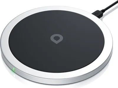 A wireless charging pad is shown on a white background.