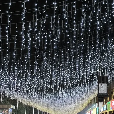 Zdjęcie produktu dla Jopassy 10m LED sople świąteczne lampki ogrodowe, zimna biel