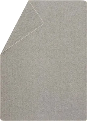 A gray blanket is shown with one corner folded over.