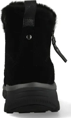 A black boot is shown from the back against a white background.