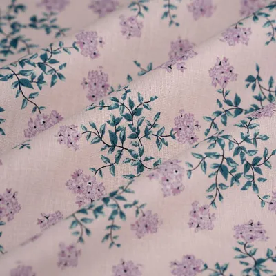 Imagen del producto de Tela de algodón con estampado floral en color crema, 150 cm de ancho, certificada