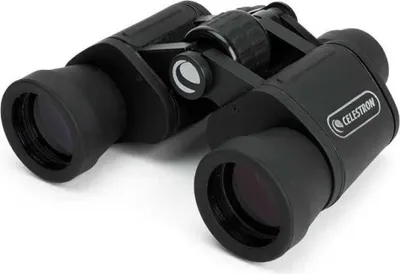 A pair of black Celestron binoculars on a white background.