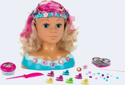 A styling head with accessories laid out around it.
