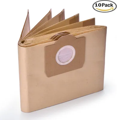 A stack of brown paper vacuum cleaner bags, fanned out, with a white circular filter visible on the front of one bag.
