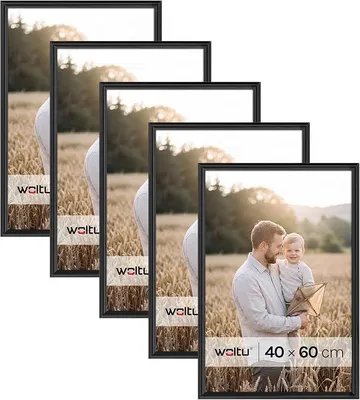 Imagen del producto de Juego de 5 marcos para fotos de 40x60 cm, fabricados en plástico y con fondo blanco