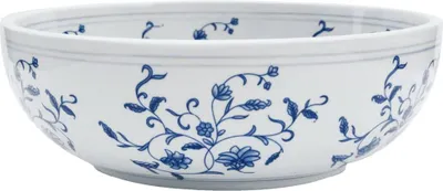 A white ceramic bowl with blue floral patterns.