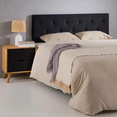 Produktbild von Kopfteil BLOMIN mit Holzbeinen 140 cm schwarz - gepolstertes Bettkopfteil mit hochwertigem Stoffbezug & elegante Zierknöpfe, passend für Doppelbetten
