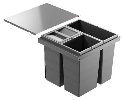 A multi-compartment waste bin system with a metal lid, shown from a diagonal angle.