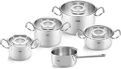 A set of stainless steel pots and pans with glass lids, arranged on a white background.