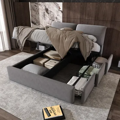 A bed with its storage compartments open, showing stored items.