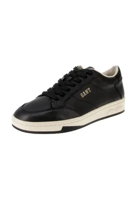 A single black sneaker is shown against a white background.