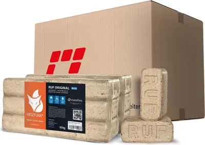 A cardboard box with a logo and several packages of wood briquettes are displayed.
