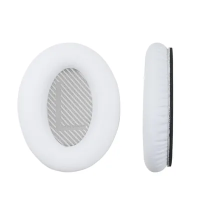 Two white headphone ear pads are shown against a white background. One ear pad is shown from the front, and the other is shown from the side.