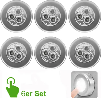 A set of six silver LED touch lights arranged in two rows, with a graphic indicating a touch function and the text '6er Set'.