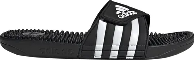 A black Adidas slide sandal with white stripes.