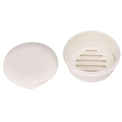 Produktbild von Runde Seifendose mit Deckel und Abtropfschale – kompakt & ideal für Reisen