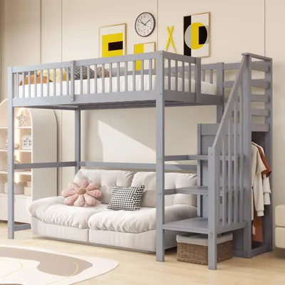 A loft bed with a sofa underneath, set up in a bedroom.