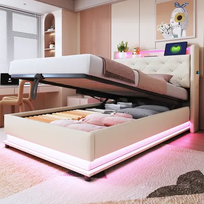A bedroom setting with a bed that has its storage compartment open, revealing stored items. The bed has LED lighting around its base.