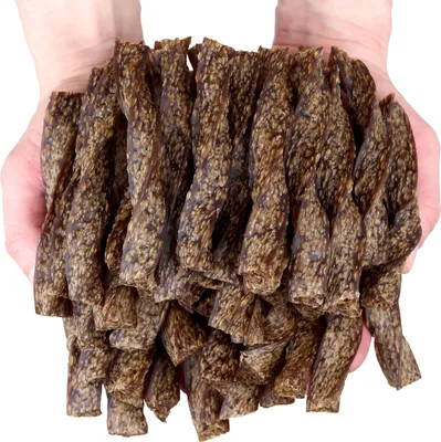 Immagine prodotto di Biscotti per cani, snack Twisted Strips al manzo Woof&Miau 500 g