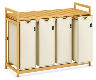 A beige laundry basket with a bamboo frame and four compartments.