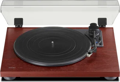 A turntable with a clear dust cover.