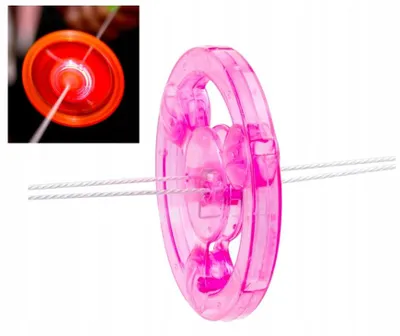 Produktbild von 7&7 Schwungrad LED Spielzeug mit Schnur 7 cm