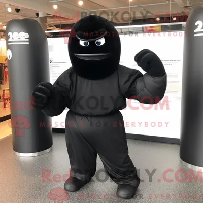 Productafbeelding van Mascottekarakter REDBROKOLY van een zwarte bokshandschoen gekleed met een cover-up en omslagdoeken