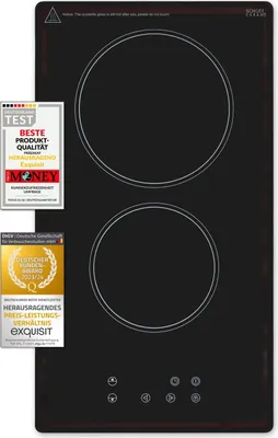 A top-down view of a black induction hob with two cooking zones. There are several award badges and certifications on the left side of the hob.
