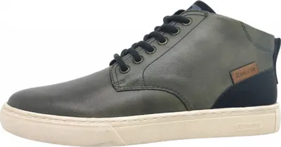 A side view of a green men's shoe.