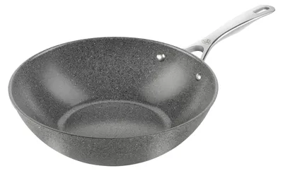 A close-up, studio shot of a wok on a white background.
