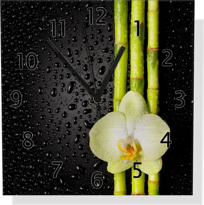 Produktbild von Wallario Design Wanduhr Grüne Orchidee mit Bambus auf schwarz - Regentropfen aus Aluverbund, Größe 30 x 30 cm